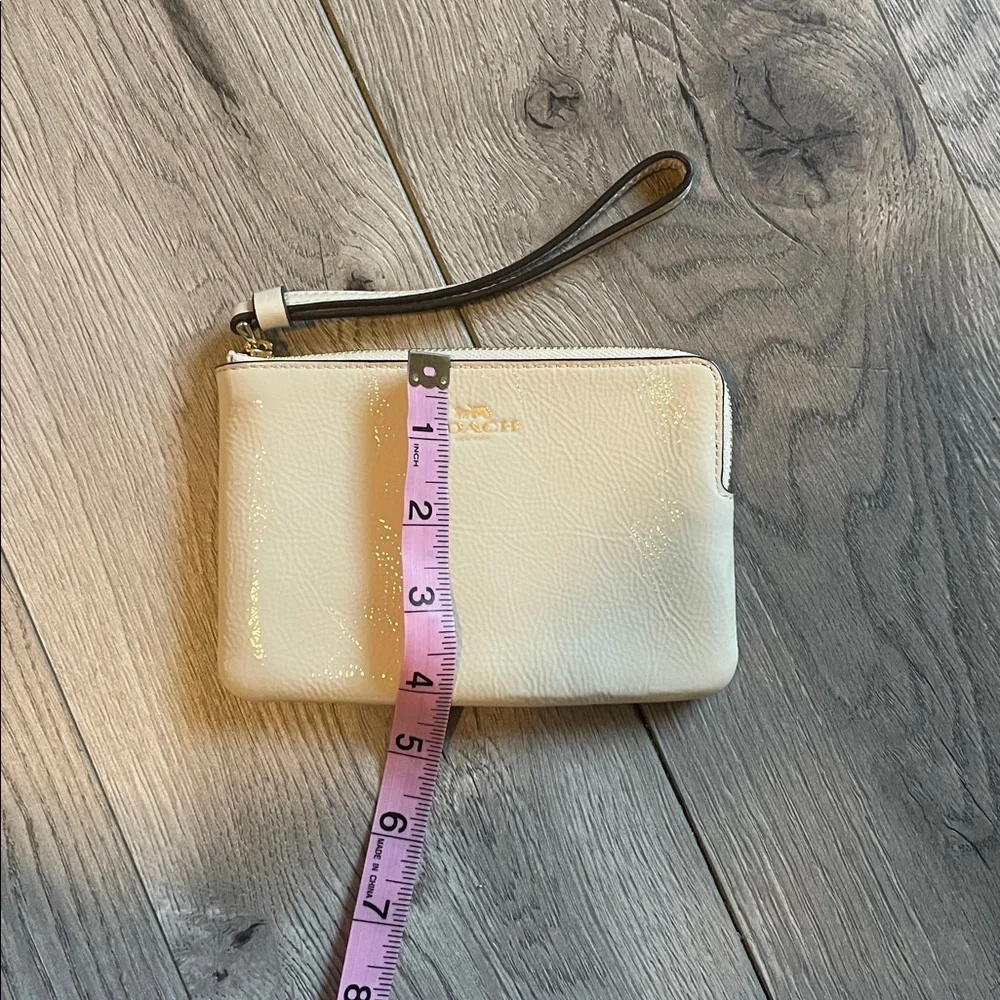 Coach Glossy Beige Wristlet